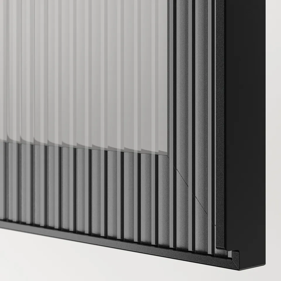 Close-up of sleek, modern drawer with vertical lines and dark finish, showcasing high-quality design and craftsmanship.