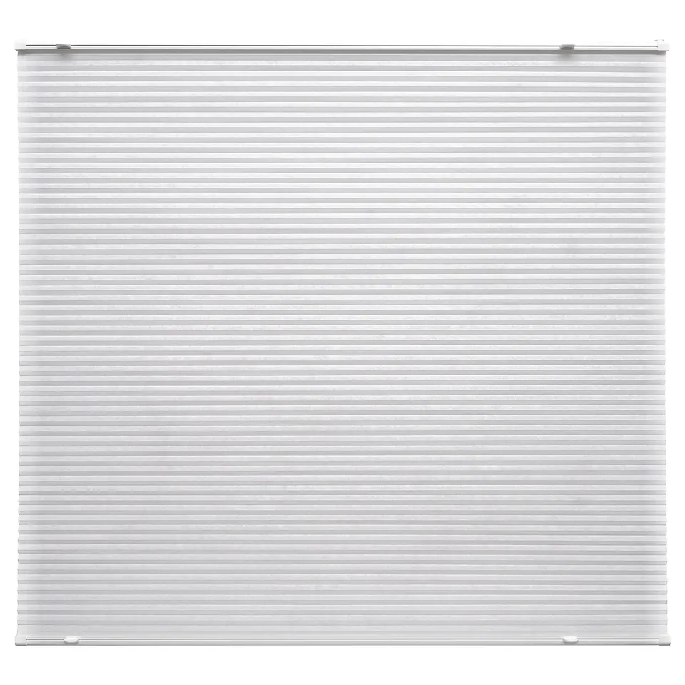 White HORNVALLMO pleated blind, cordless, polyester, rectangular, patterned holes for light philtre.