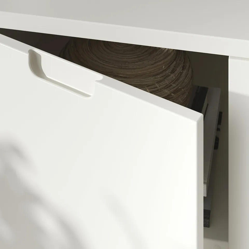 TONSTAD off-white cabinet detail, showing handle and adjustable shelf.