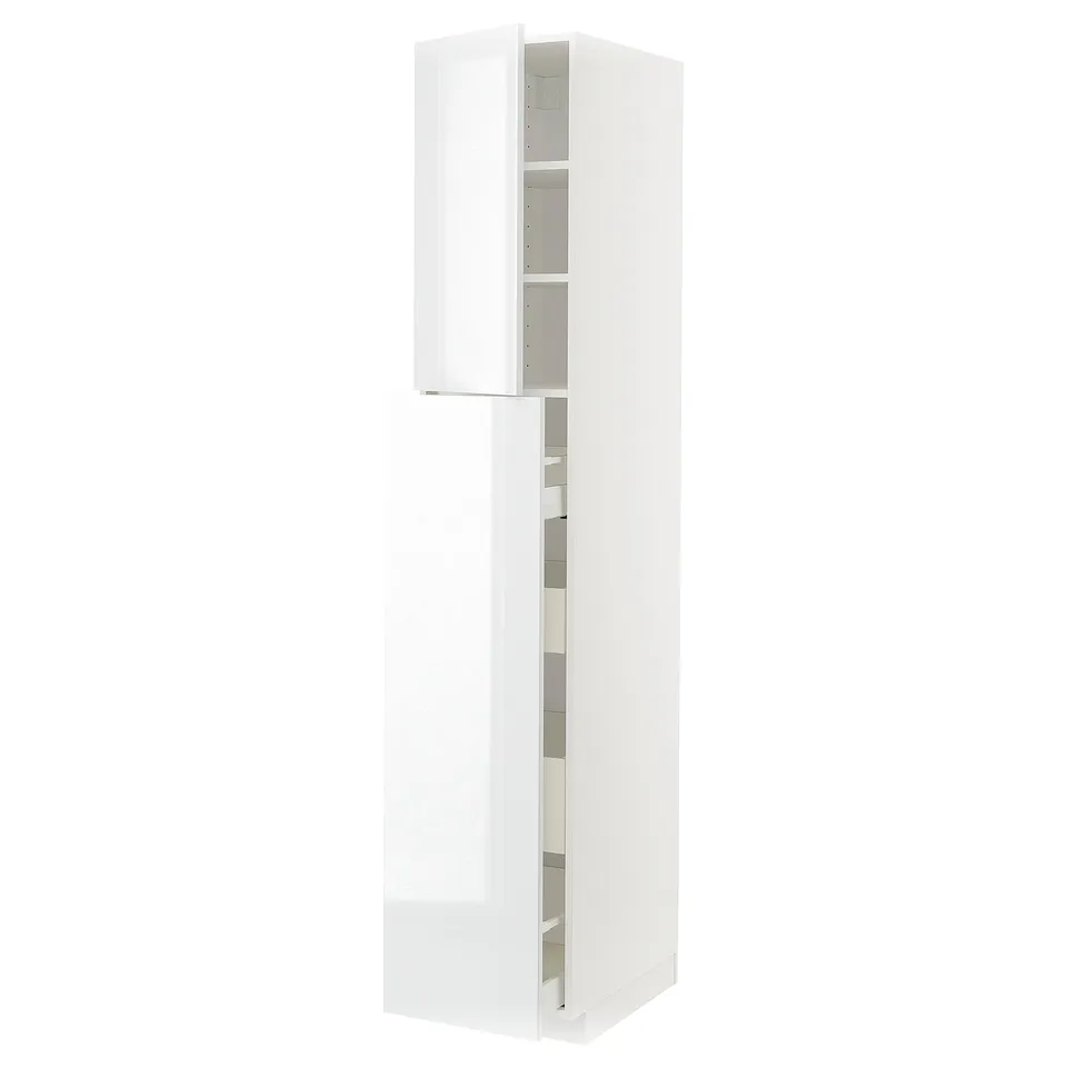 A modern white ikea METOD kitchen cabinet, featuring a high-gloss finish, with multiple shelves and a drawer.