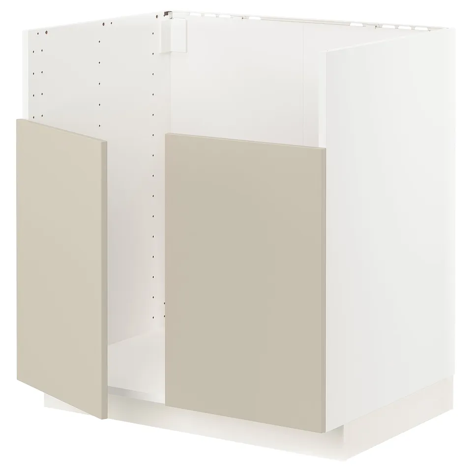 A white METOD kitchen cabinet with beige doors, featuring a modern clean design.