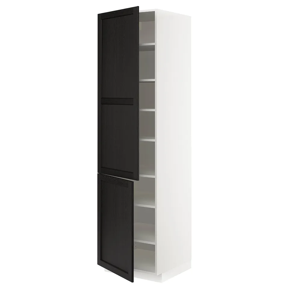 A white and black rationell METOD kitchen cabinet with adjustable shelves and two black doors.