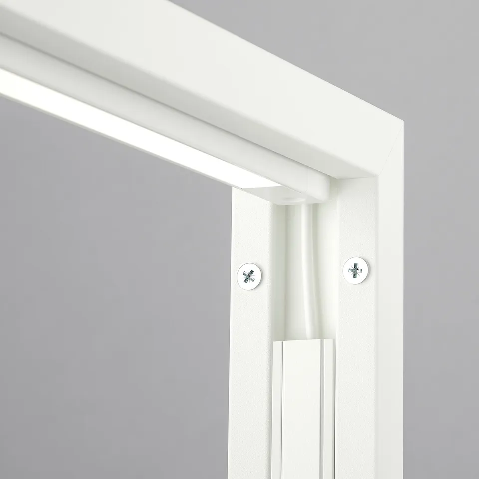 A close-up of a clean, modern, white wall-mounted frame with visible screws. The frame appears durable and well-constructed.
