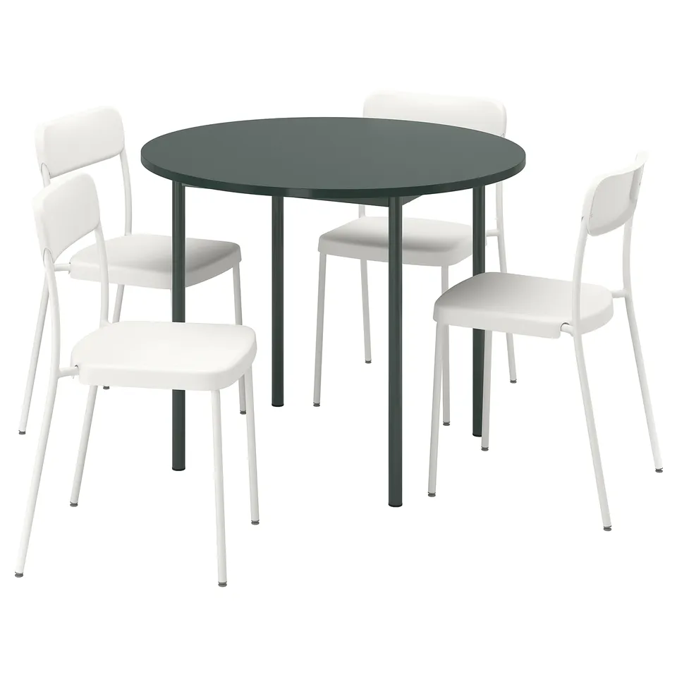 IKEA PS 2026: round, modern dining set in matte green with four stackable white chairs and a dark green table.