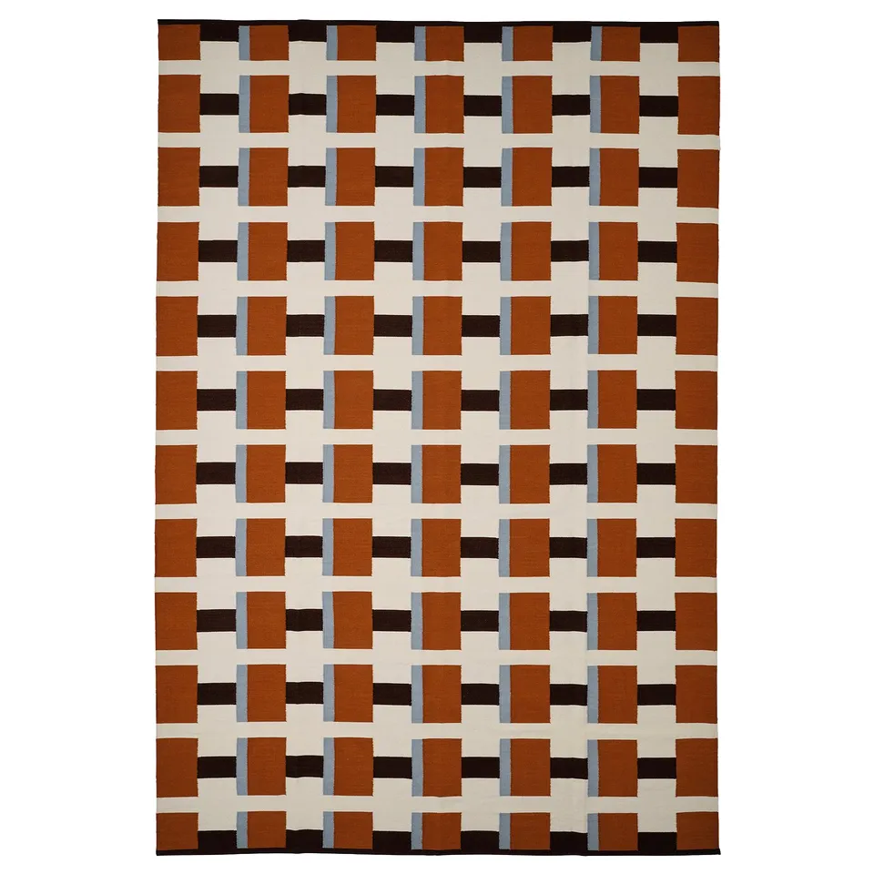 Handwoven wool rug, geometric brown, black, beige pattern, scandinavian style.