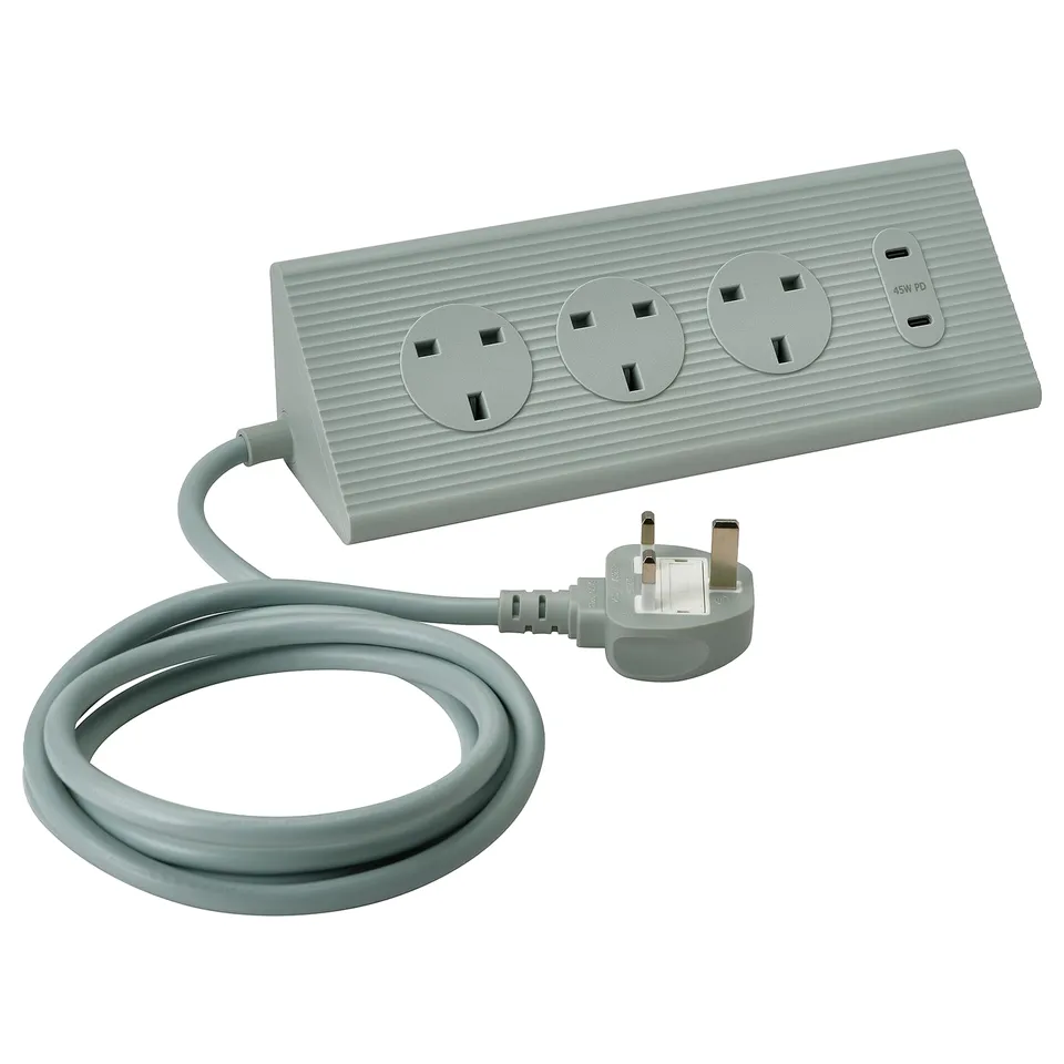 SKOTAT grey extension cord, recycled polycarbonate, minimalist design, 3 ac outlets, 2 usb ports, flexible positioning.