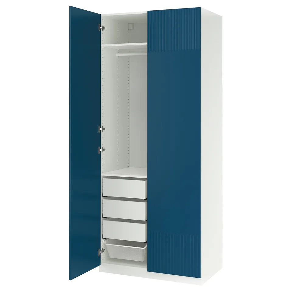 PAX wardrobe: tall blue-white unit, textured doors, drawers, shelves.