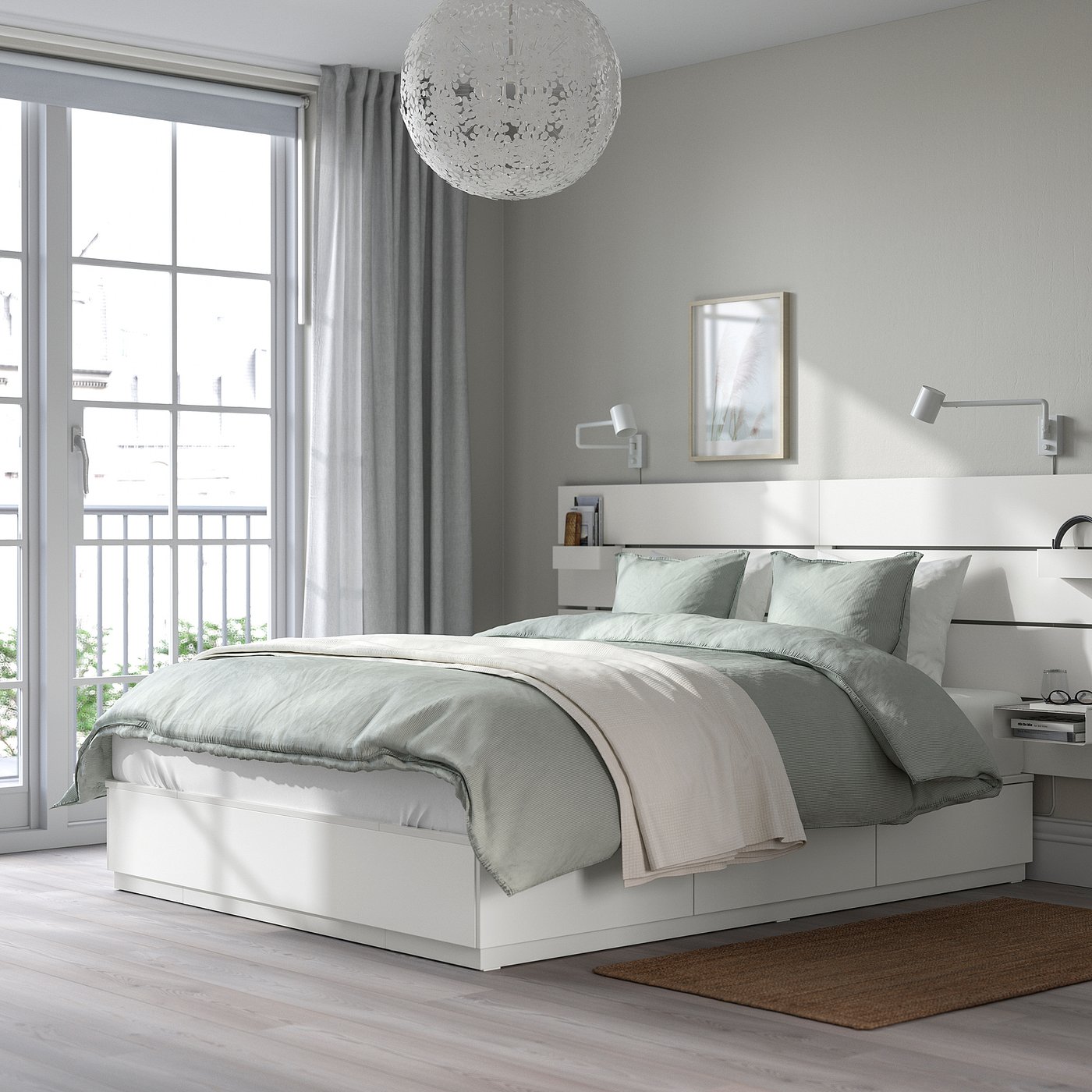 Modern bedroom with NORDLI bed, grey linen, chandelier, large window