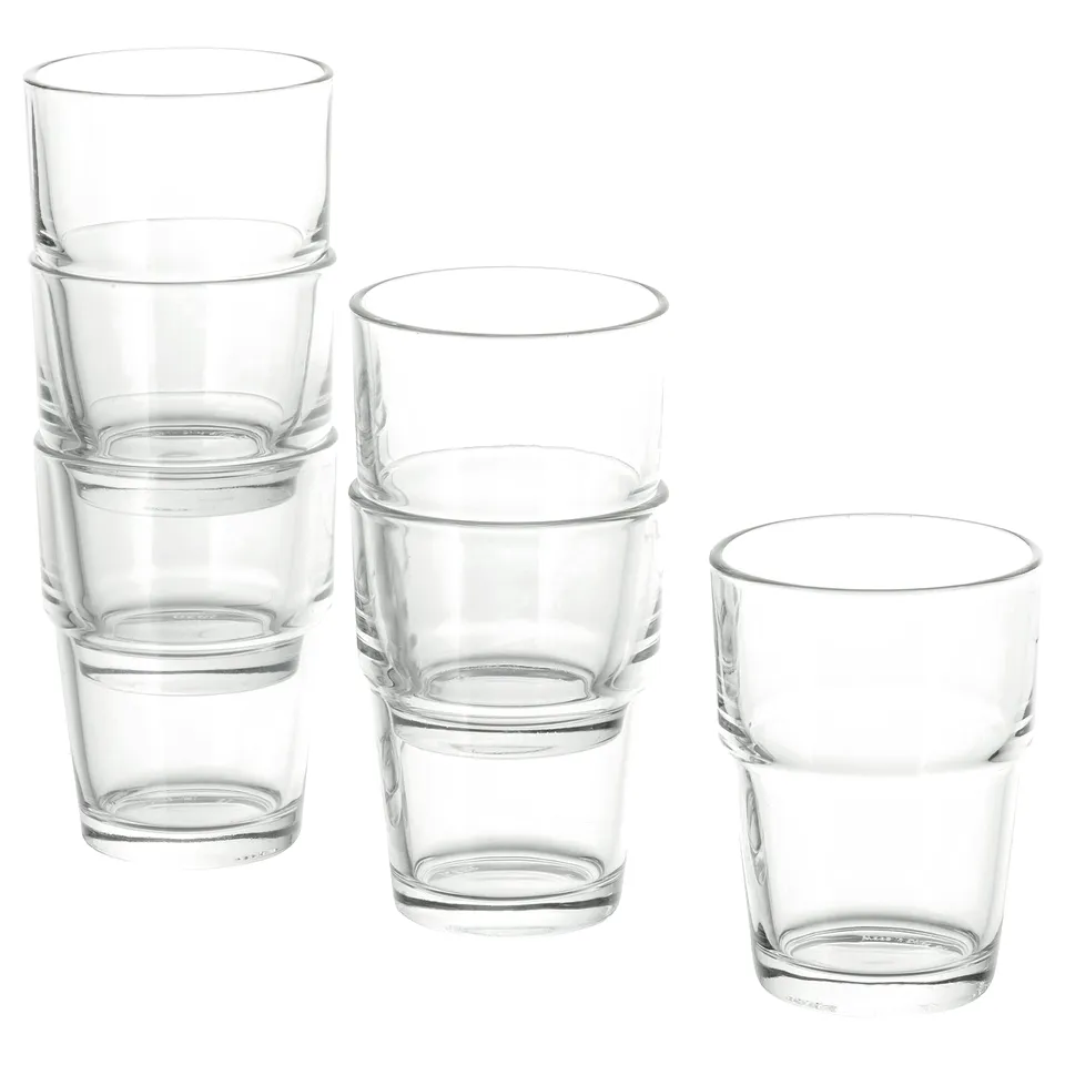 Stacks of transparent REKO glasses in various sizes, made of glass, and designed to stack neatly for space-saving.