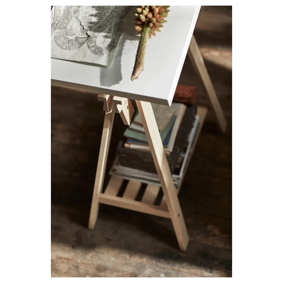 LAGKAPTEN white and beige desk with books.