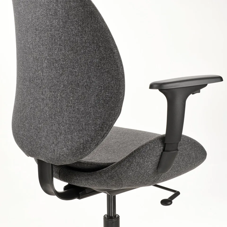 Ergonomic office chair with adjustable armrests and backrest. Tilt mechanism for comfort and support. Dark fabric seat and back.