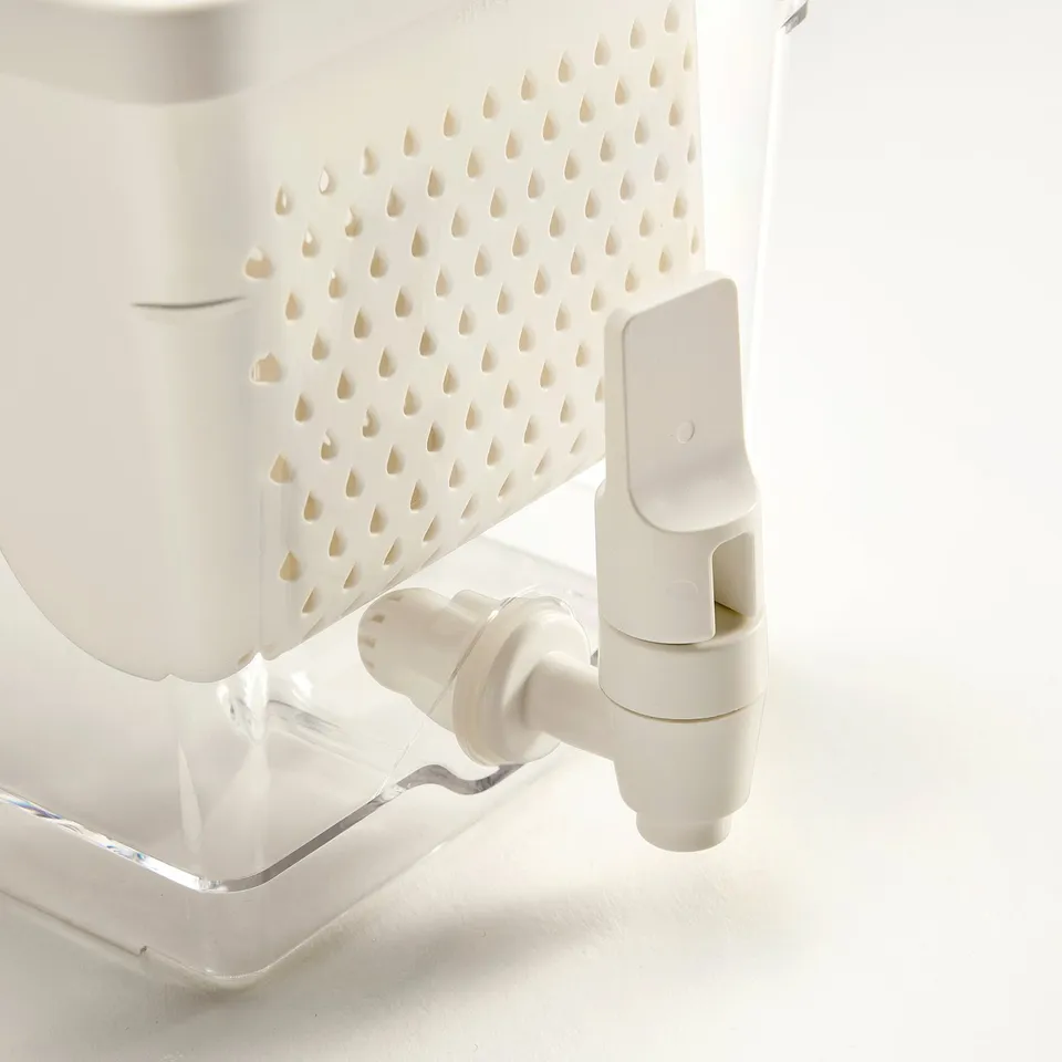 White water dispenser with perforated lid, spill-proof tap.