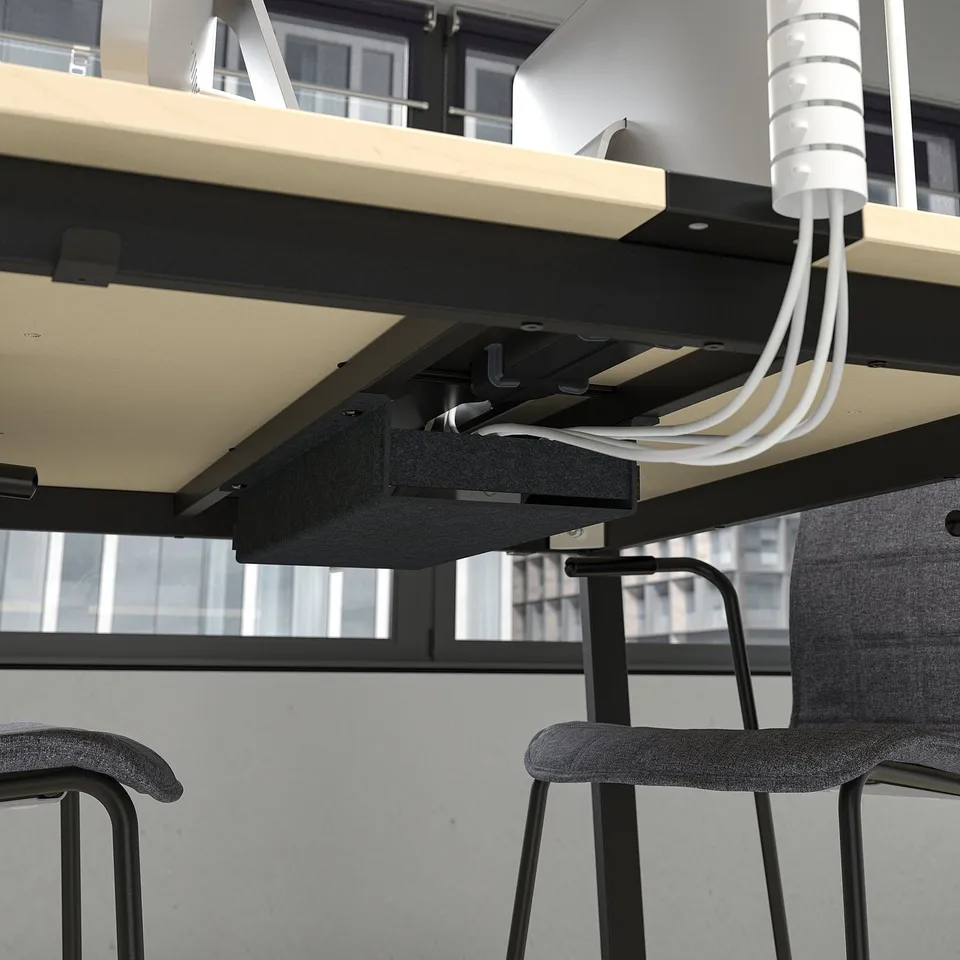 Under desk cable management system shown, part of MITTZON conference table.