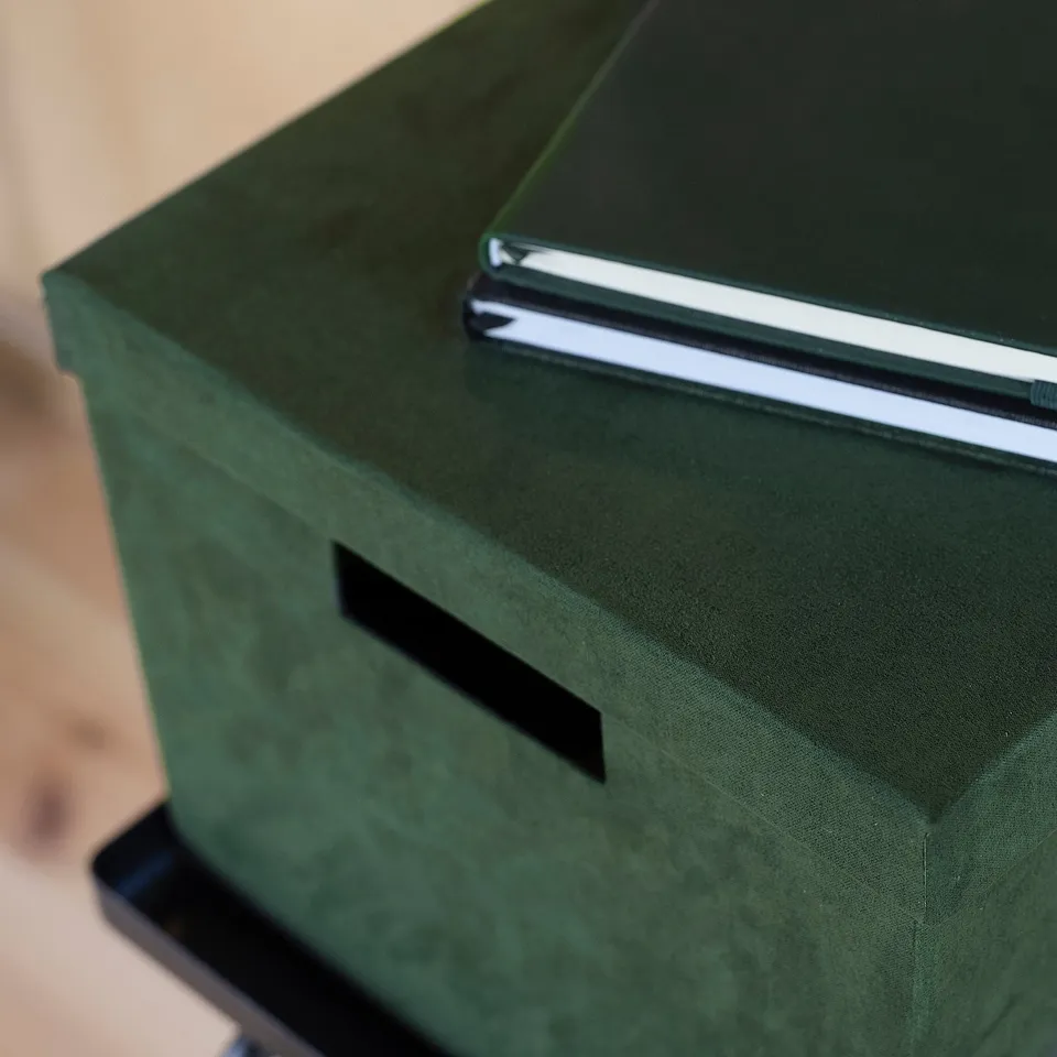 Green velvet storage box with cut-out handles, designed for a4 and letterhead paper, fits in various storage systems.