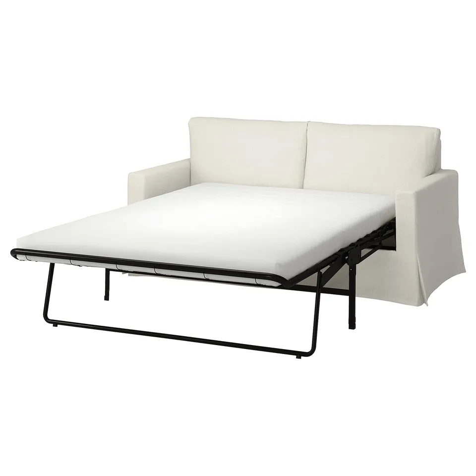 A white HYLTARP sofa-bed with a clean design, soft cushions, and metal legs.