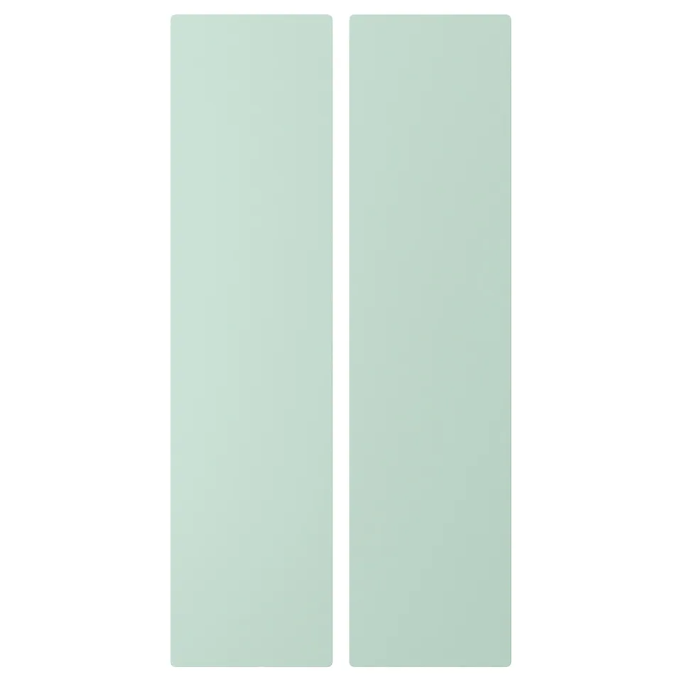 Image shows SMÅSTAD door in mint green. Rectangular, soft rounded corners, pastel design.