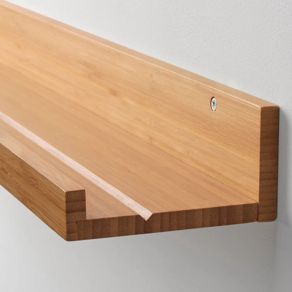 Wooden shelf on grey wall, smoothly finished and sturdy.