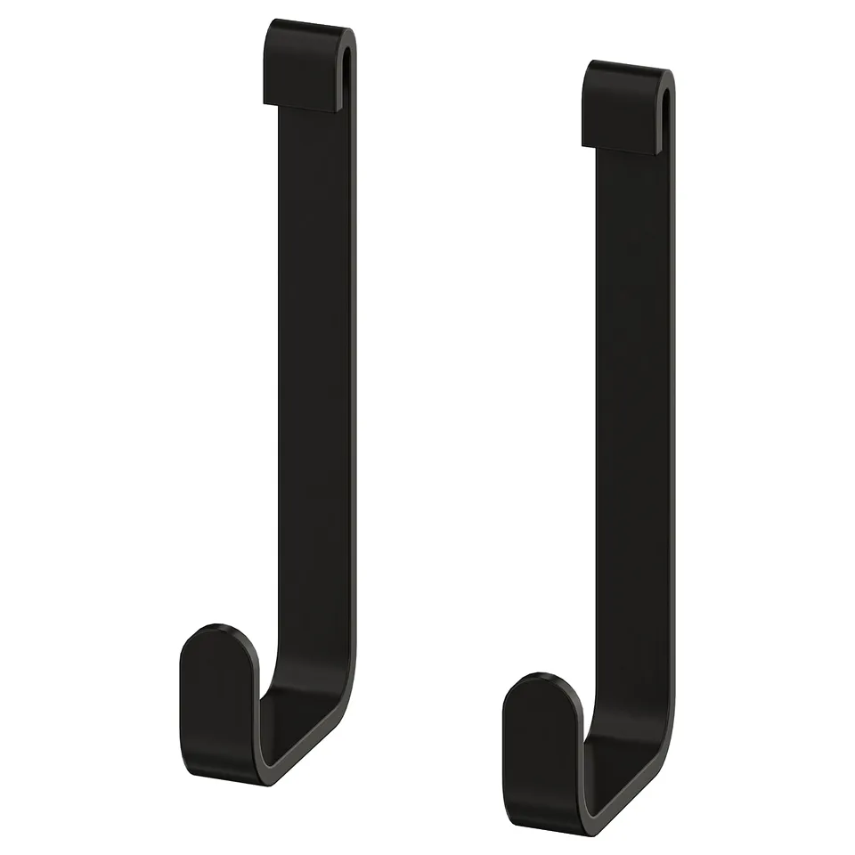 Two black ENHET hooks, sleek and minimalist, made of powder-coated stainless steel, designed for wall mount with grooves.