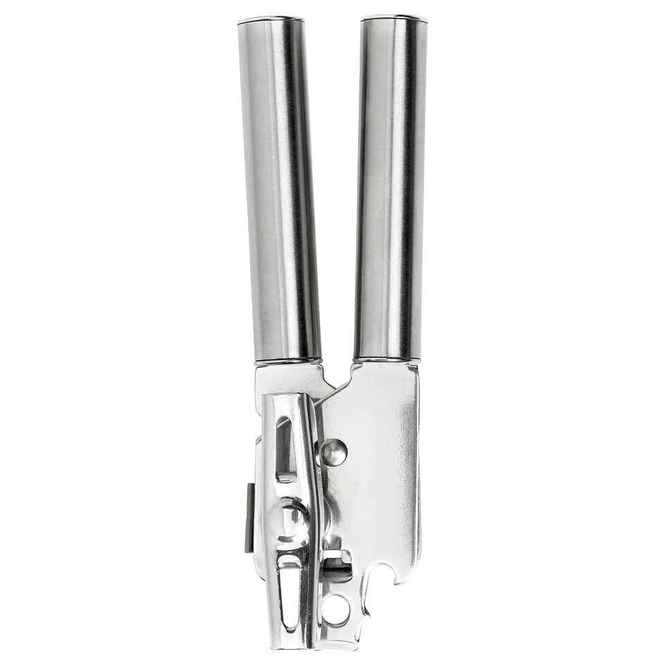 A silver KONCIS can opener. It has long, cylindrical handles with a mechanical gear system. The metallic design is sleek and functional.