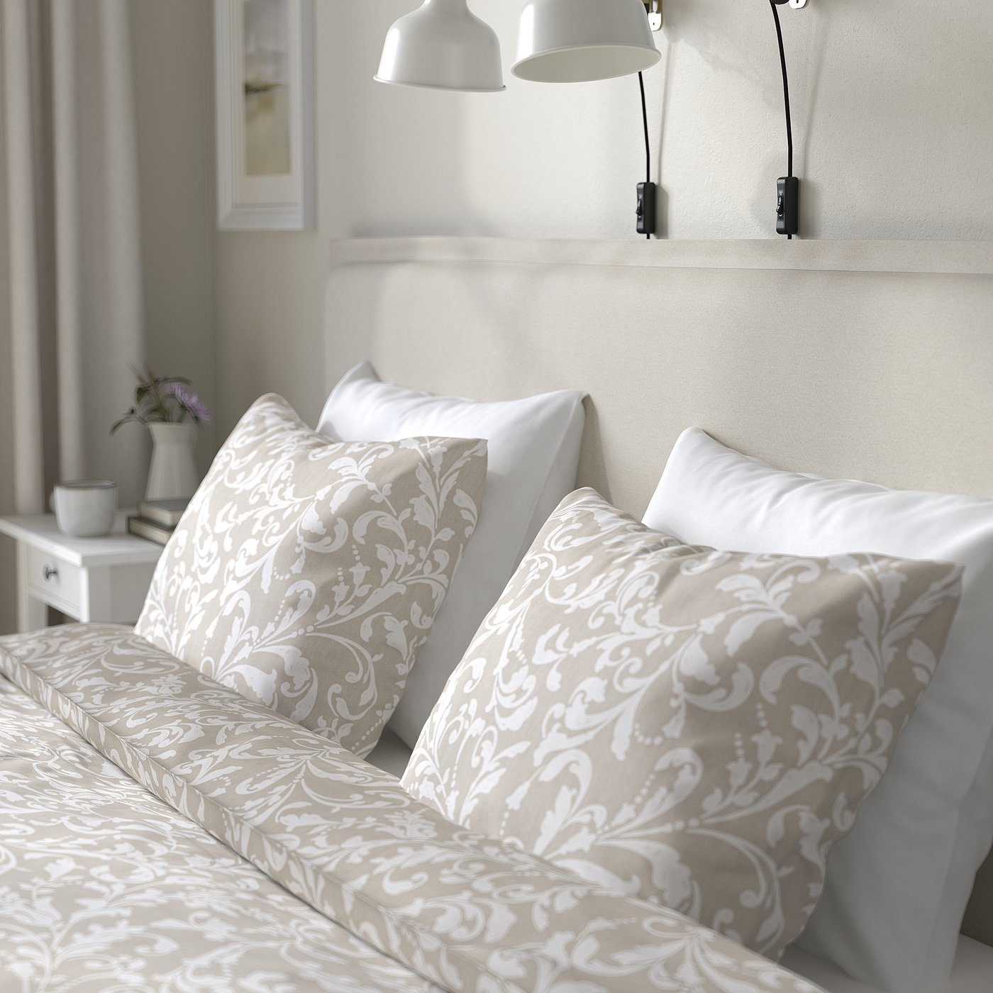 A cosy bed with a padded headboard and ornate pillows, perfect for reading and watching tv. The removable cover keeps it clean and fresh.