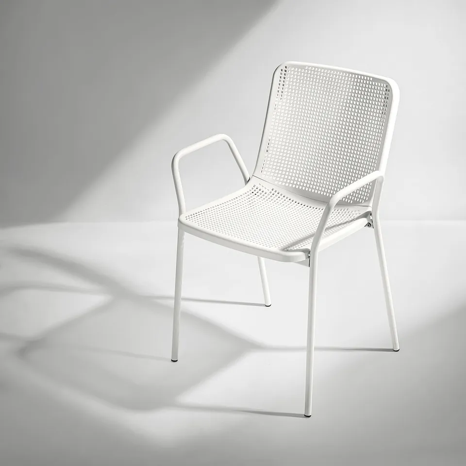 TORPARÖ white outdoor chair; sleek, modern design with perforated seat and back, durable steel and plastic, ideal for small to large outdoor spaces.