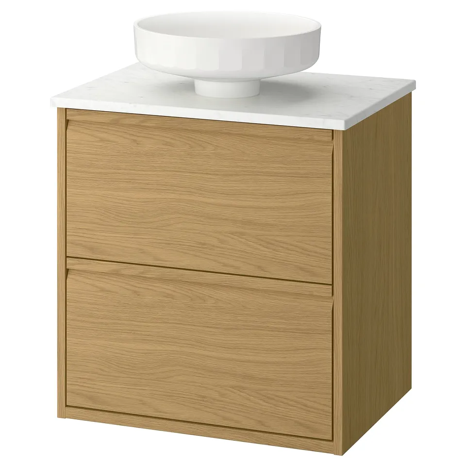 An ÄNGSJÖN light oak washstand with a white marble countertop and round basin. Modern, natural, wall-mounted design with integrated handles.
