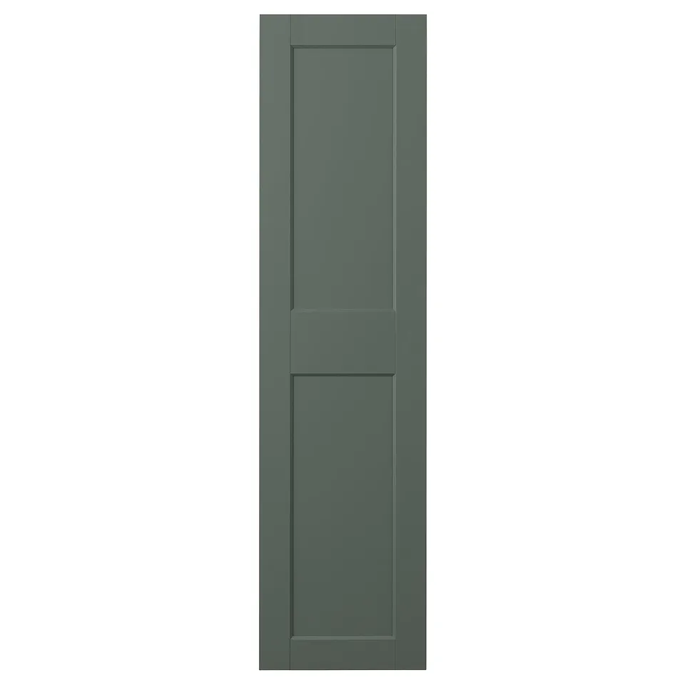GRIMO door in grey-green has a modern and traditional shape, featuring wide framed panels and a clean line design.