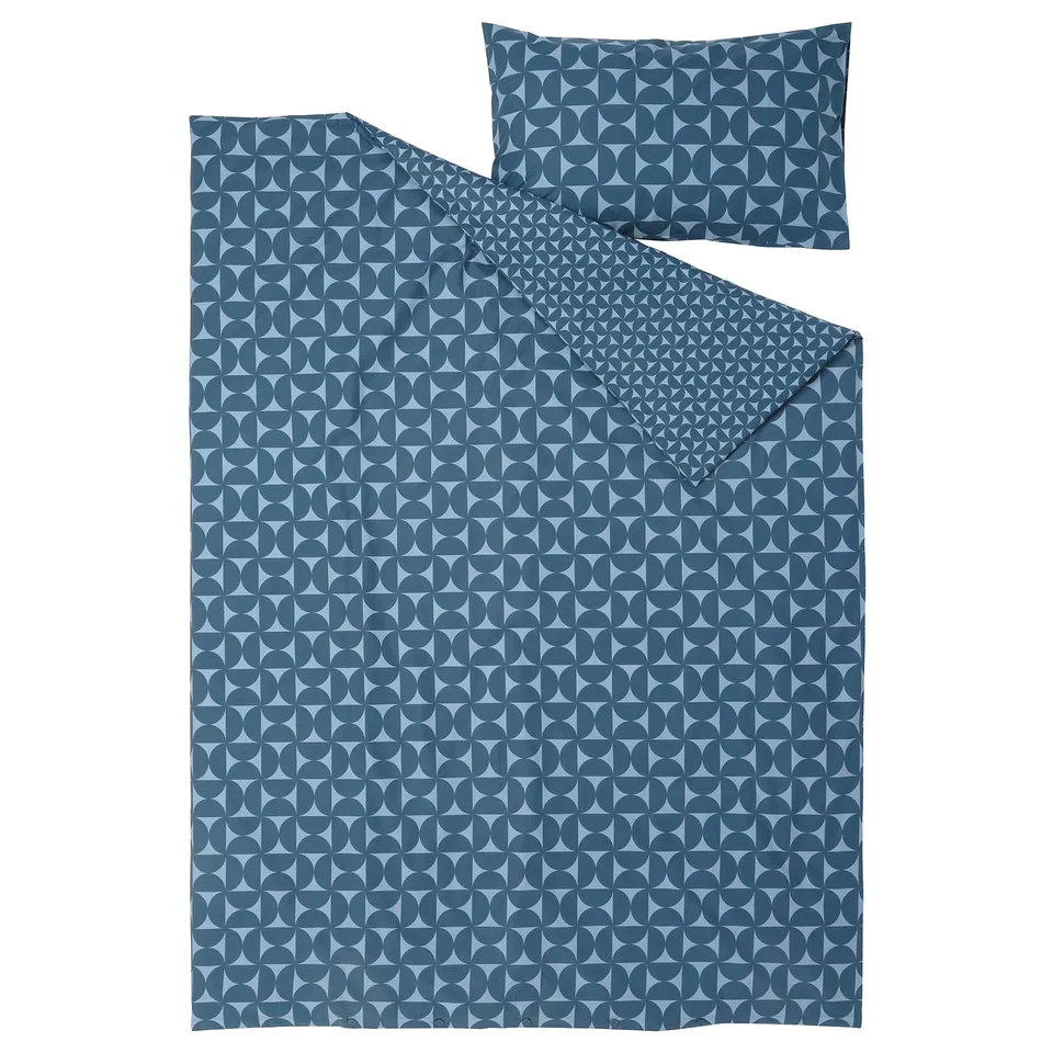 Blue geometric duvet with circular pattern, soft cotton-viscose blend, button/envelope closure.