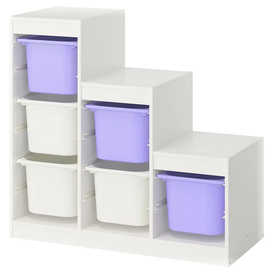 A white TROFAST storage unit with purple and white bins, ideal for childs room organisation.