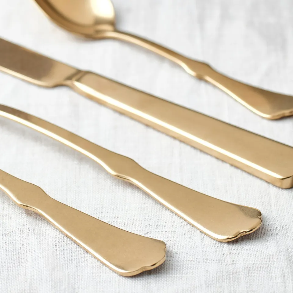 NATTKLOT 24-piece cutlery set, gold-colour