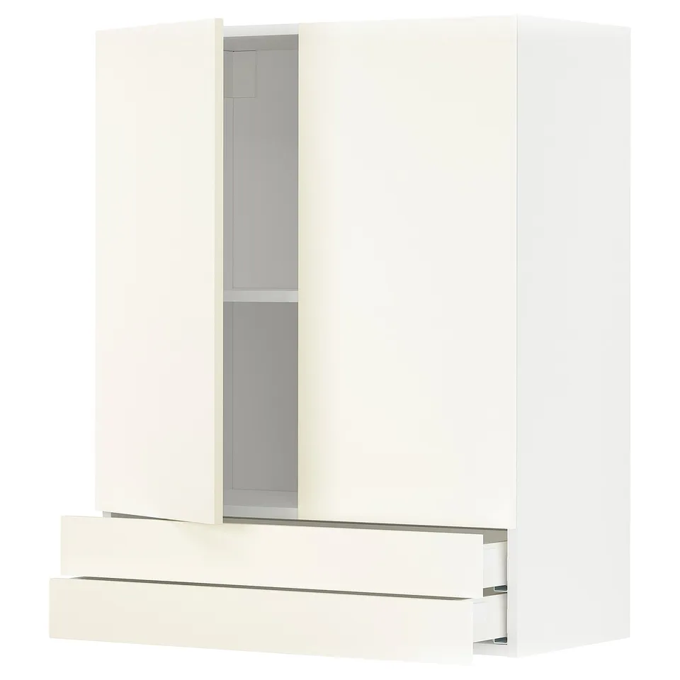 A white METOD kitchen cabinet with a drawer and adjustable shelf.