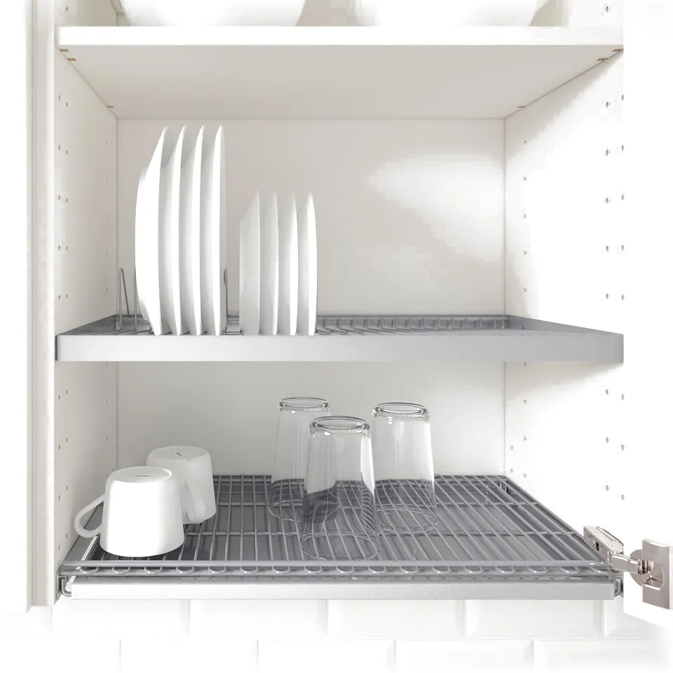 Kitchen cabinet shelf with adjustable metal racks storing white plates and glasses.