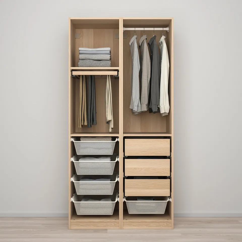 Organised wooden closet with hanging shirts, folded clothes, and metal baskets. Adaptable storage solutions for various clothing items.