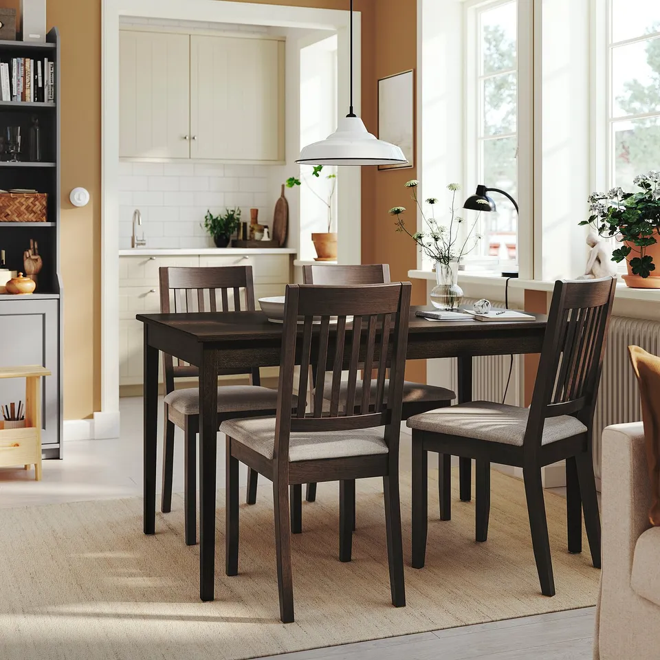 Modern farmhouse dining set with dark brown table & beige chairs. Sleek, high-back slatted design. Perfect for small spaces.