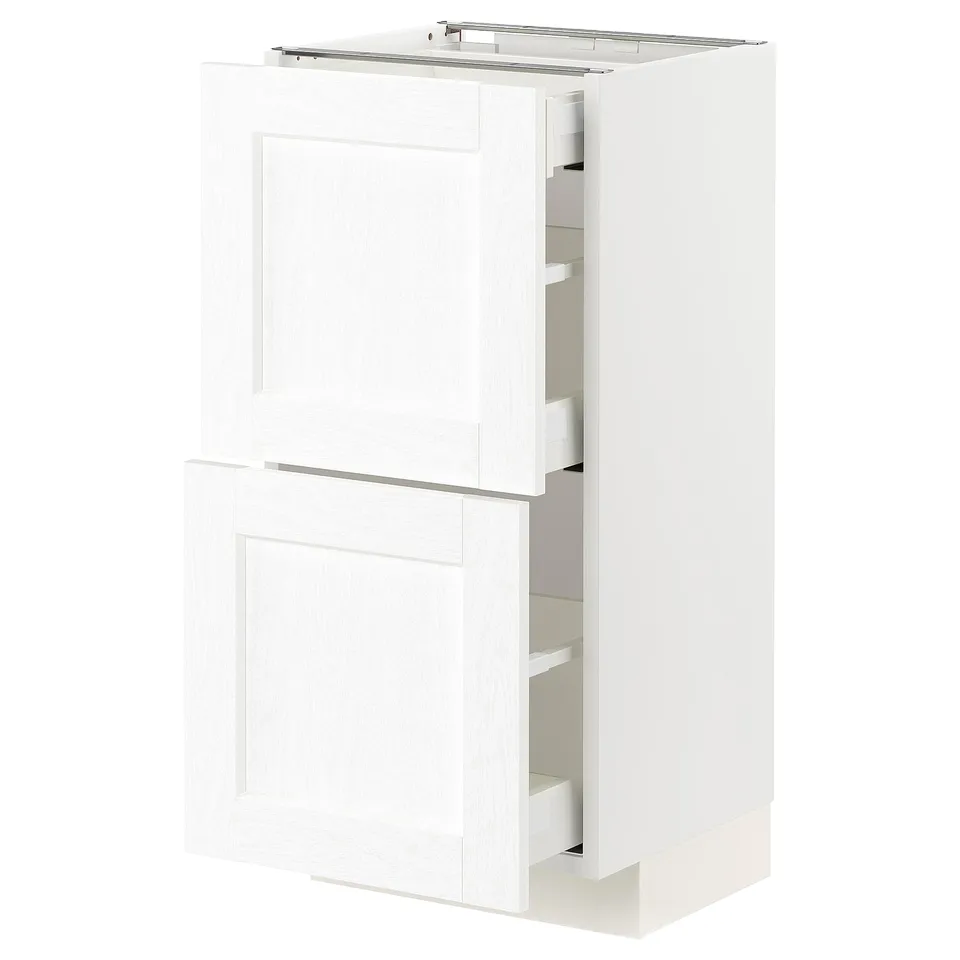 A white METOD kitchen cabinet with two drawers and one shelf. The cabinet has a modern, minimalist design with clean lines and smooth edges.