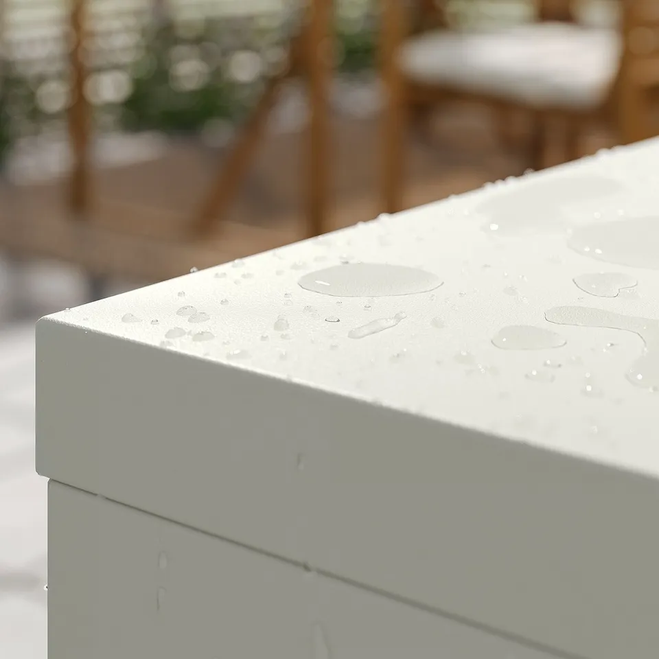 SUNDSÖ white cabinet edge with raindrops; sleek, modern design.