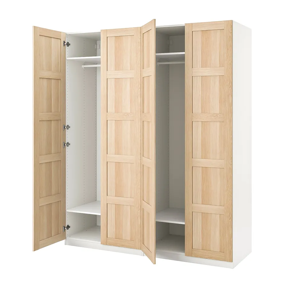 An open wooden wardrobe with light doors and white interior.