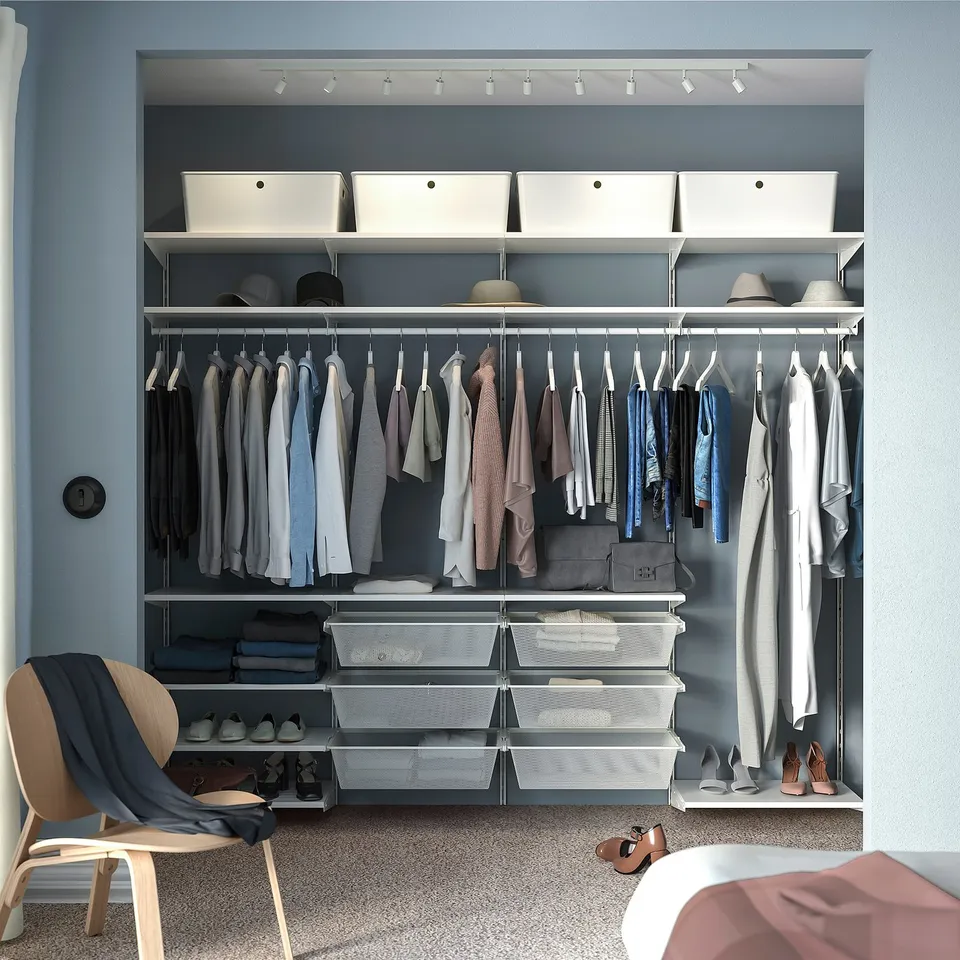 Modern closet with BOAXEL system, clothes, shelves, storage, & lighting.