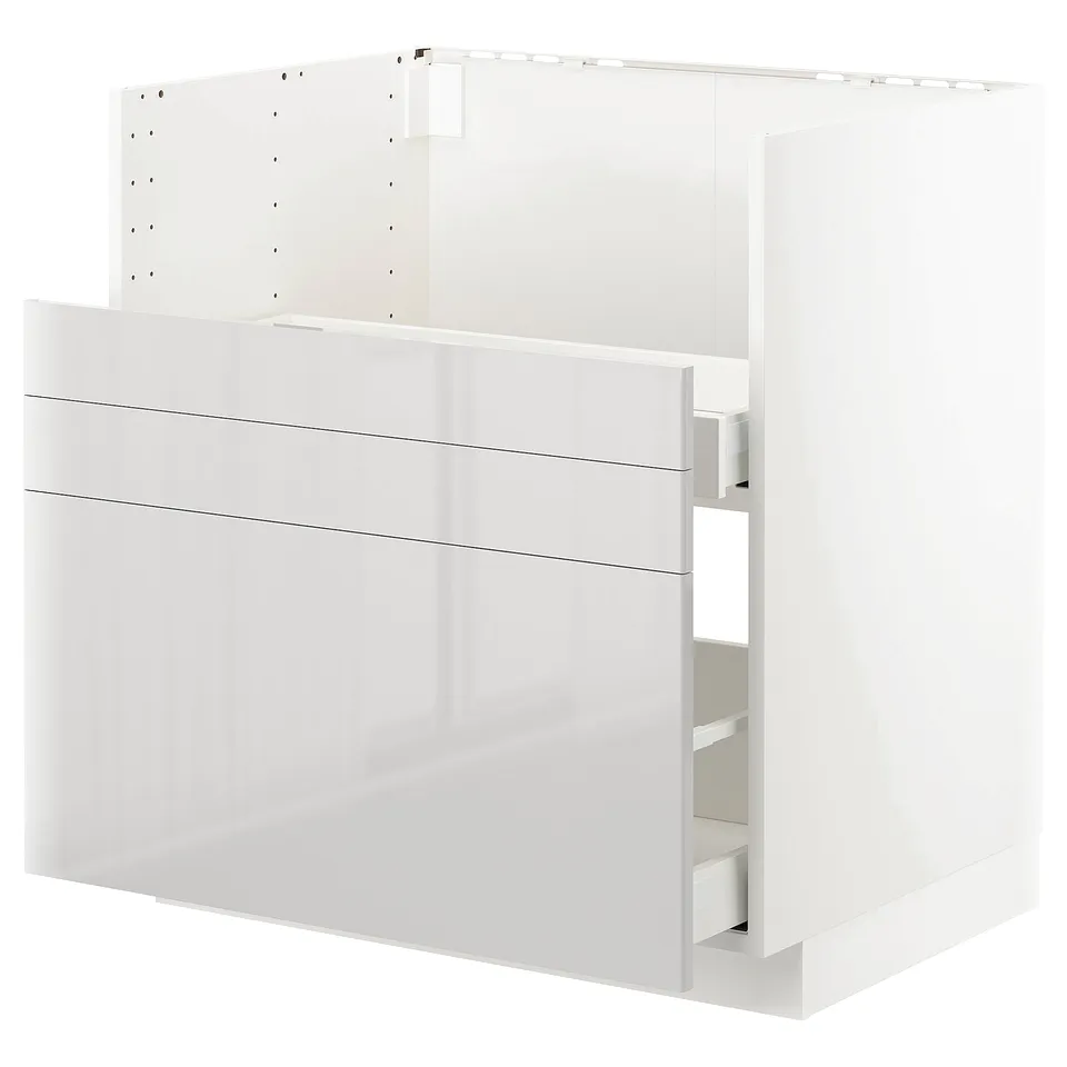 METOD white kitchen unit: modern design, glossy drawers, durable frame, sleek white finishes.