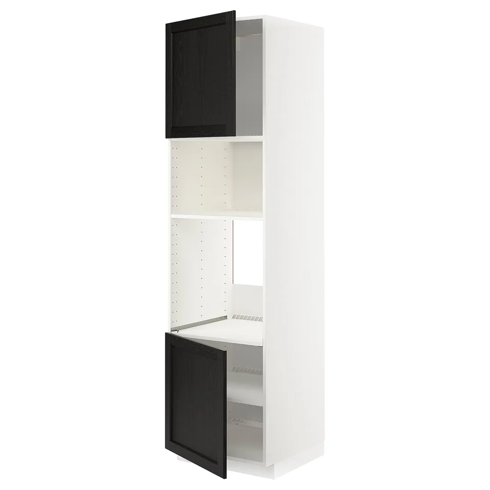 Displays a tall, white storage cabinet with two black doors from the METOD kitchen system, featuring a classic design with adjustable shelves.