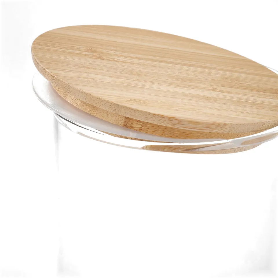 Close-up of stylish glass jar with wooden lid, showcasing quality materials and design.