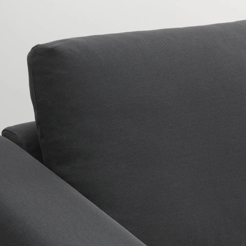 Section of dark grey VIMLE sofa, showcasing high-quality upholstery and cushions.