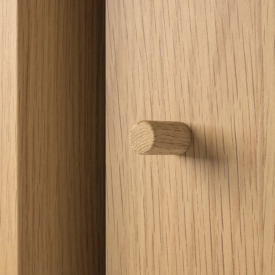 Grainy wooden surface with narrow, diamond-shaped handle.