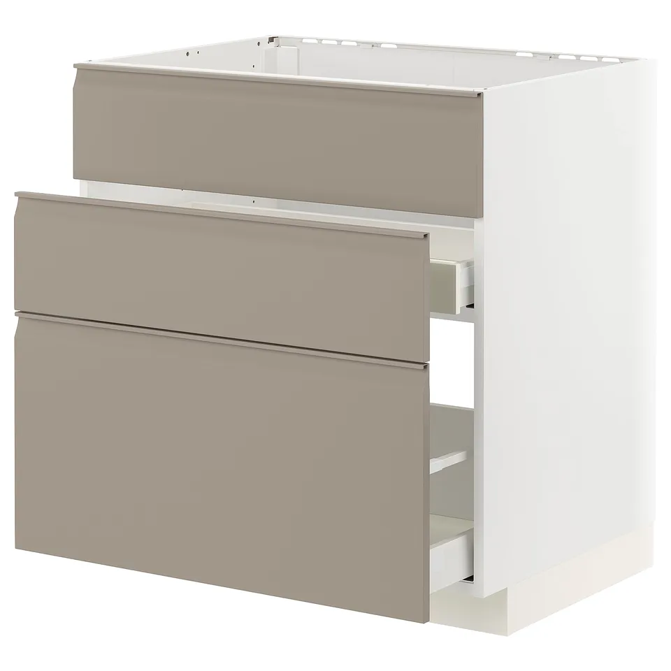 Modern kitchen cabinet set with beige drawers, sleek handles, and ample storage.