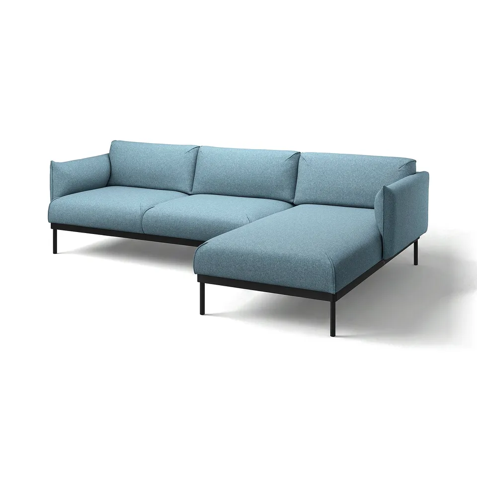 Blue modern l-shaped sofa with clean lines and cushioned seats. Elevated by slim black metal legs.