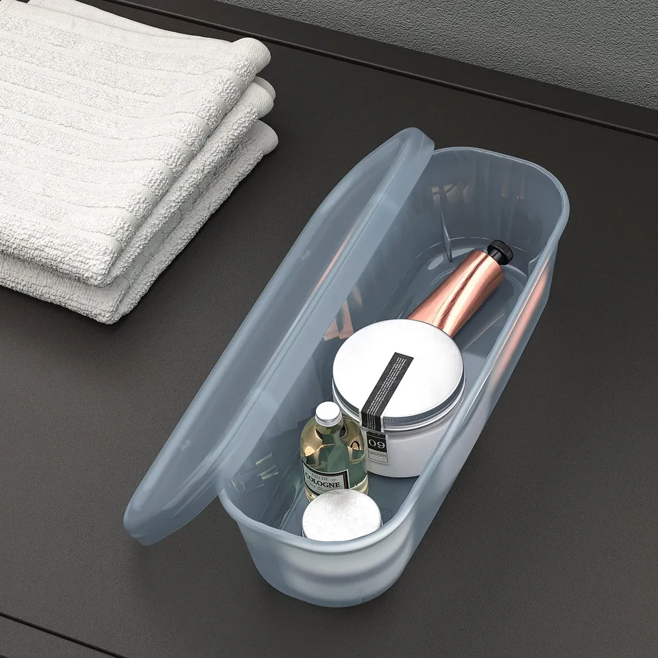 Storage box with lid for toiletries or office supplies.