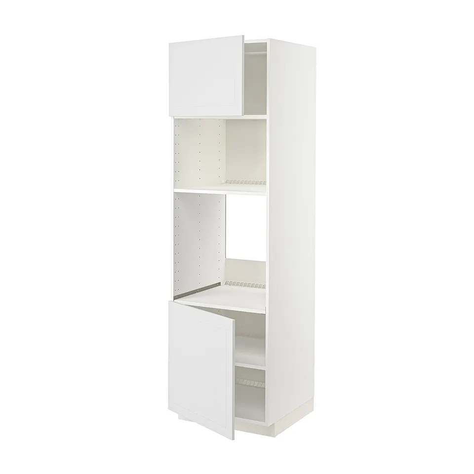 White METOD kitchen unit with open door, shelves, and integrated fridge/oven frame.