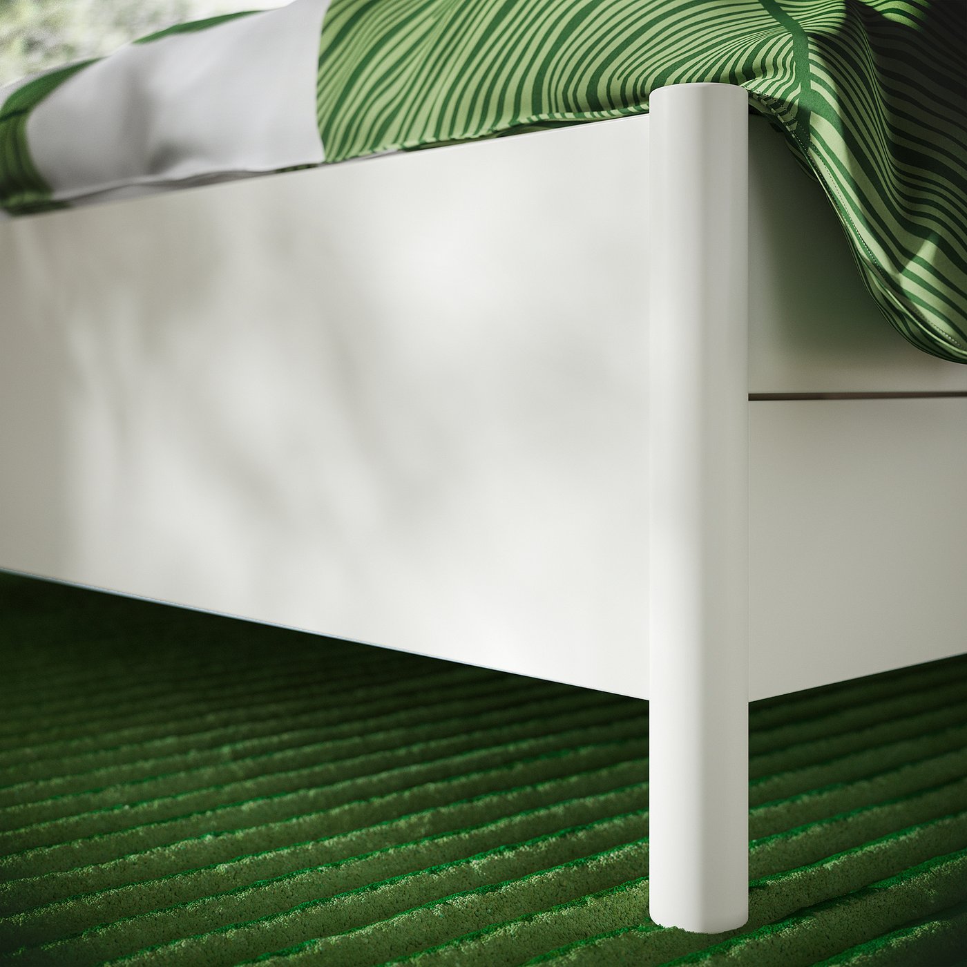 White bed frame with soft-close drawers, sturdy construction, under-bed storage, green striped bedding.