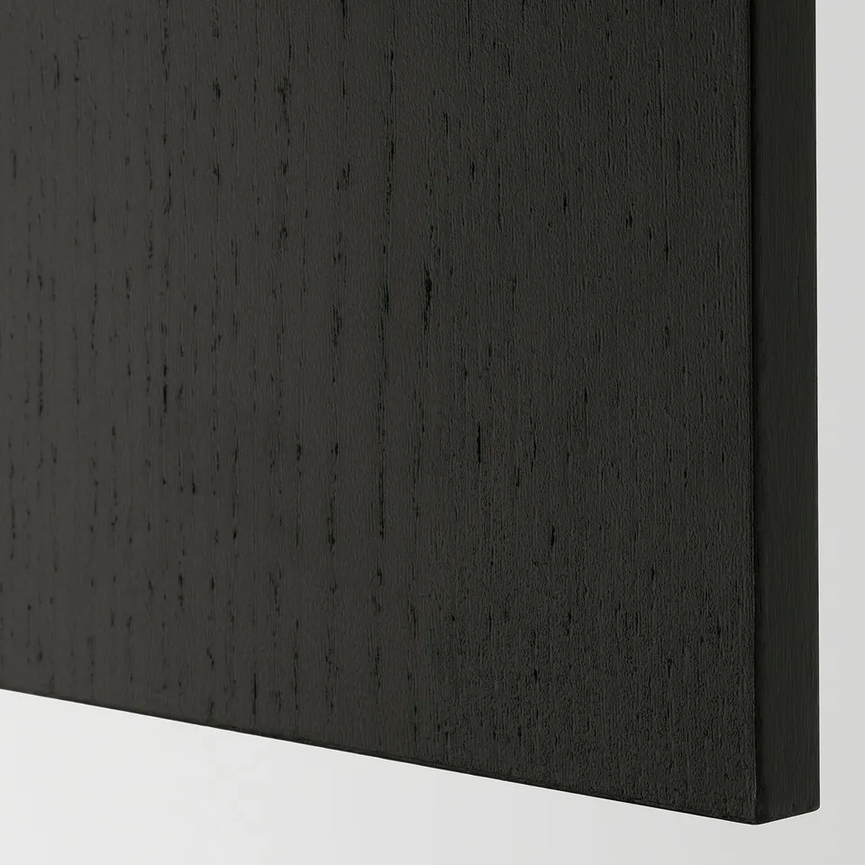 Close-up of sleek black wooden panel with textured finish, clean edges, and smooth surface.