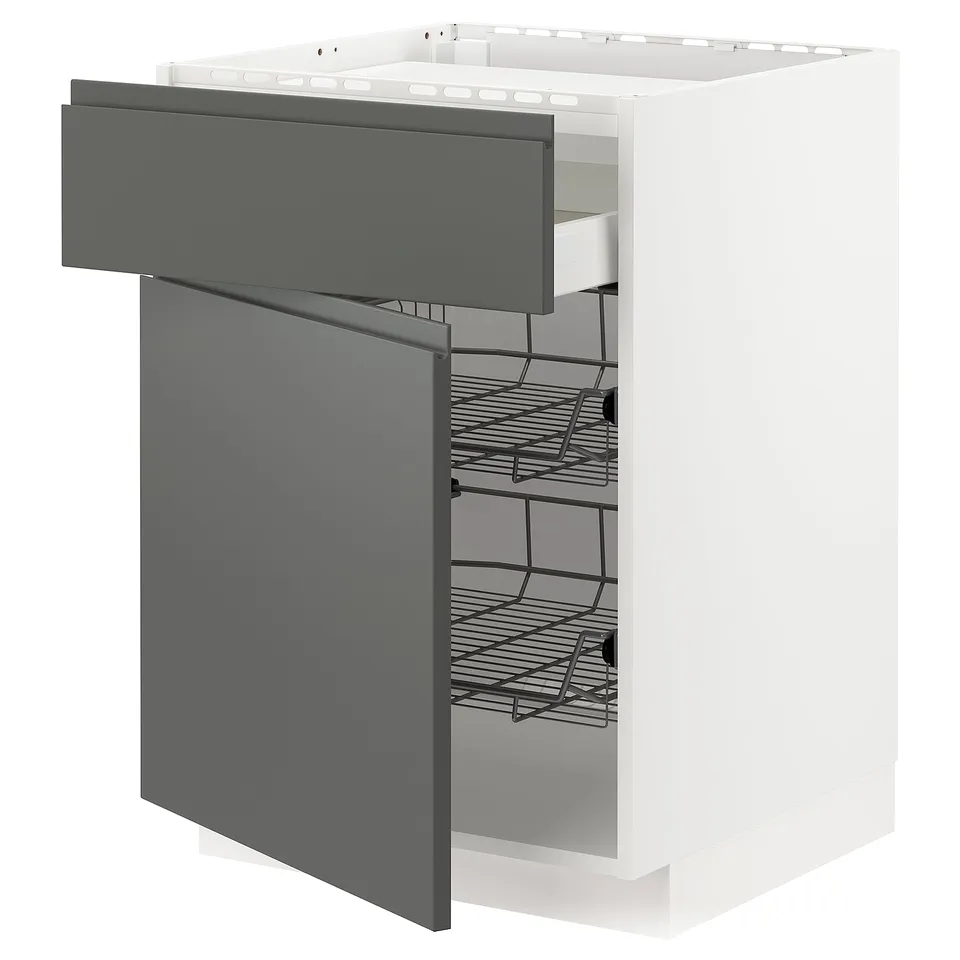 A white METOD kitchen cabinet with dark grey voxtorp drawers. It multiple shelves and smooth-gliding baskets.